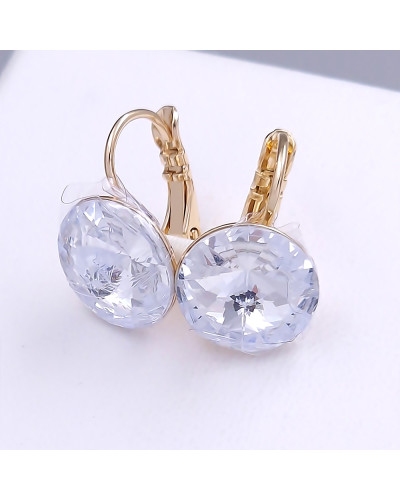 Сережки XР зі Swarovski білого кольору. Мед. золото 18К. Довжина: 17 мм. Ширина: 12 мм.