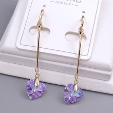Сережки XР зі Swarovski. Мед. золото 18К. Довжина: 49 мм. Ширина: 9 мм.