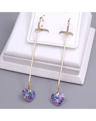 Сережки XР зі Swarovski. Мед. золото 18К. Довжина: 71 мм. Ширина: 9 мм.