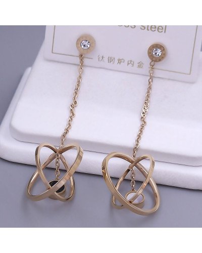 Сережки-гвоздики Stainless Steel. Сталь. Під золото КО. Камені білого кольору. Довжина: 70 мм. Ширина: 21 мм.