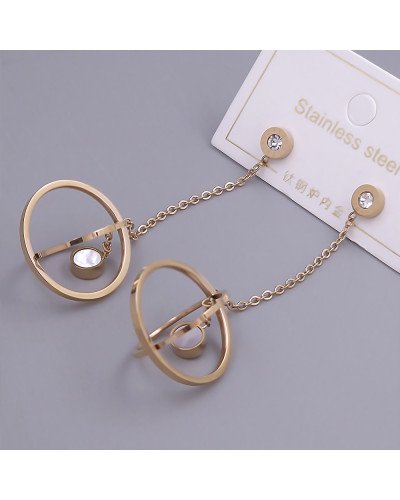 Сережки-гвоздики Stainless Steel. Сталь. Під золото КО. Камені білого кольору. Довжина: 70 мм. Ширина: 21 мм.