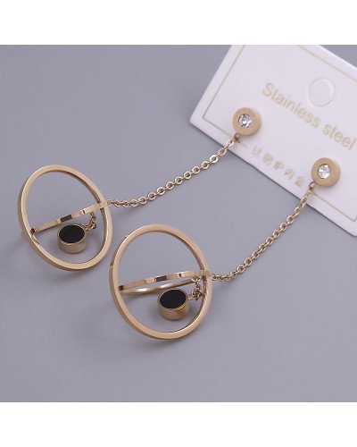 Сережки-гвоздики Stainless Steel. Сталь. Під золото КО. Камені білого кольору. Довжина: 70 мм. Ширина: 21 мм.