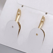 Сережки XР зі Swarovski. Мед. золото 18К. Довжина: 22 мм. Ширина: 9 мм.