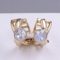 Сережки XР зі Swarovski білого кольору. Мед. золото 18К. Діаметр: 15 мм. Ширина: 8 мм.
