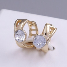 Сережки XР зі Swarovski білого кольору. Мед. золото 18К. Діаметр: 15 мм. Ширина: 8 мм.