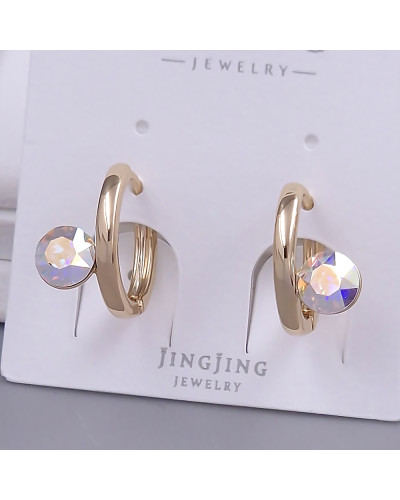 Сережки XР із Swarovski бензинового кольору. Мед. золото 18К. Діаметр: 15 мм. Ширина: 8 мм.